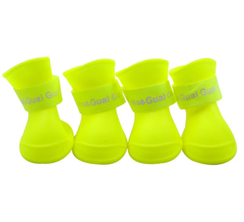 The pet dog boots with four silicone antiskid shoes wear waterproof shoes candy colored pet rainy days appear essential